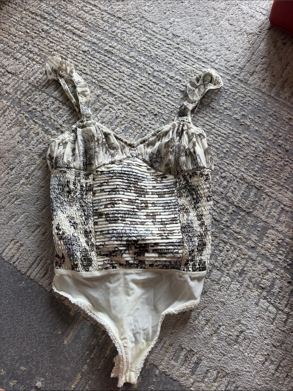 Free People Cream Floral Smocked Bodysuit with Ruffled Straps and Pleated Front
